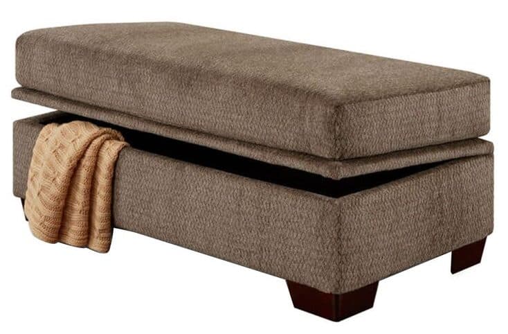 A storage ottoman provides hidden living room storage.